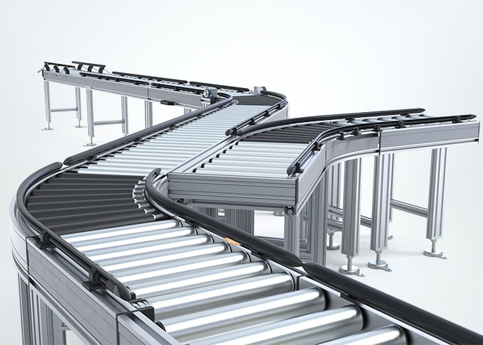 Robotunits Rollenbahnsystem mit Kurvenmodulen – modulare Fördertechnik für industrielle Anwendungen.
